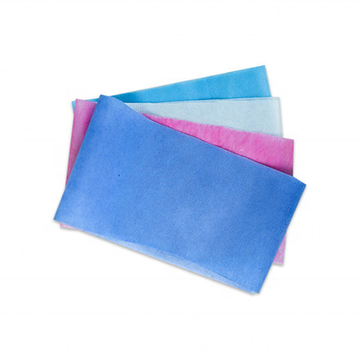 comprar material descartável da roupa da tela de tecelagem não de 30gsm PP com a estratificação do filme do PE online manufacture